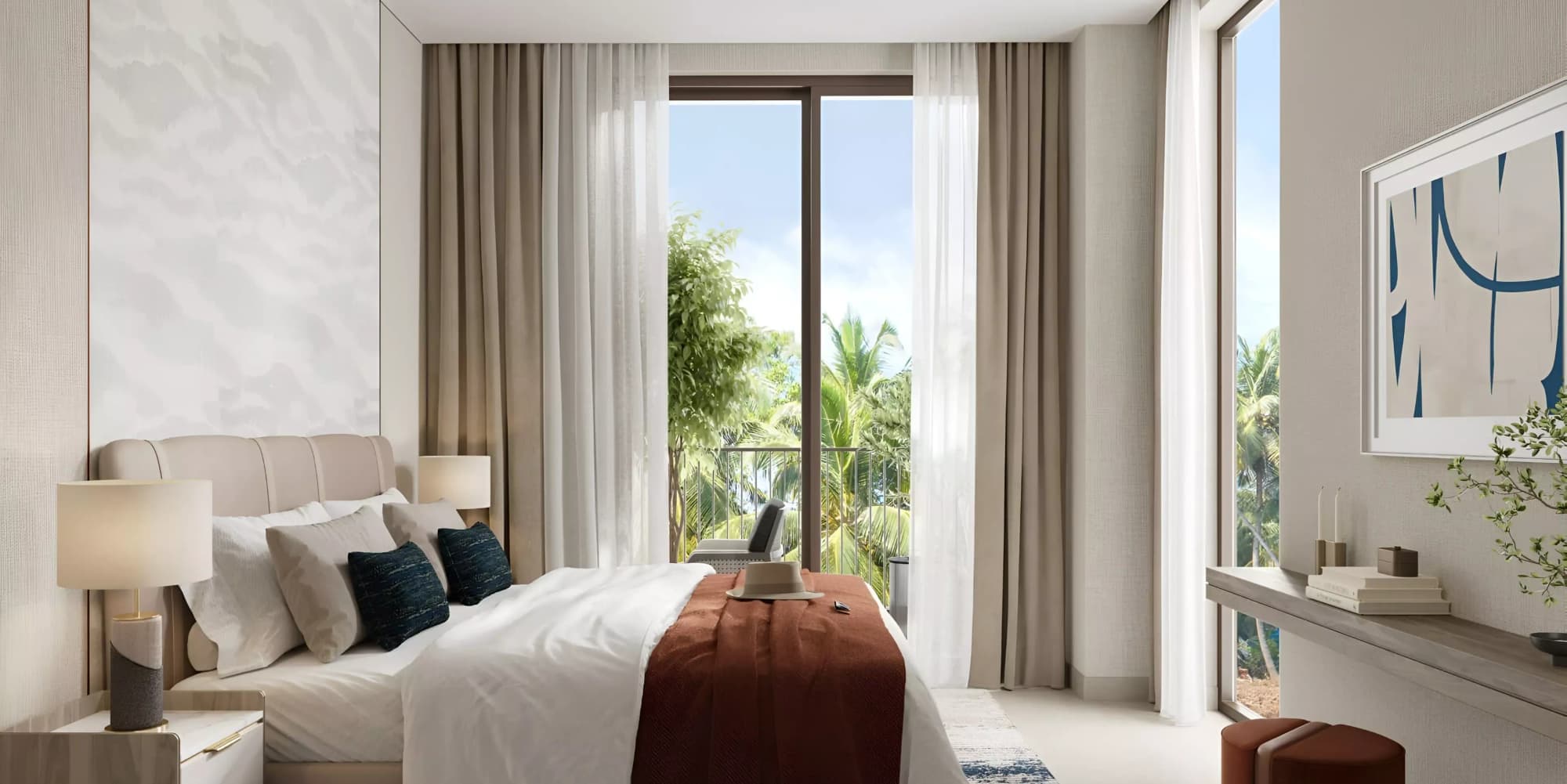 A calm bedroom with tall curtains and a window onto palm trees